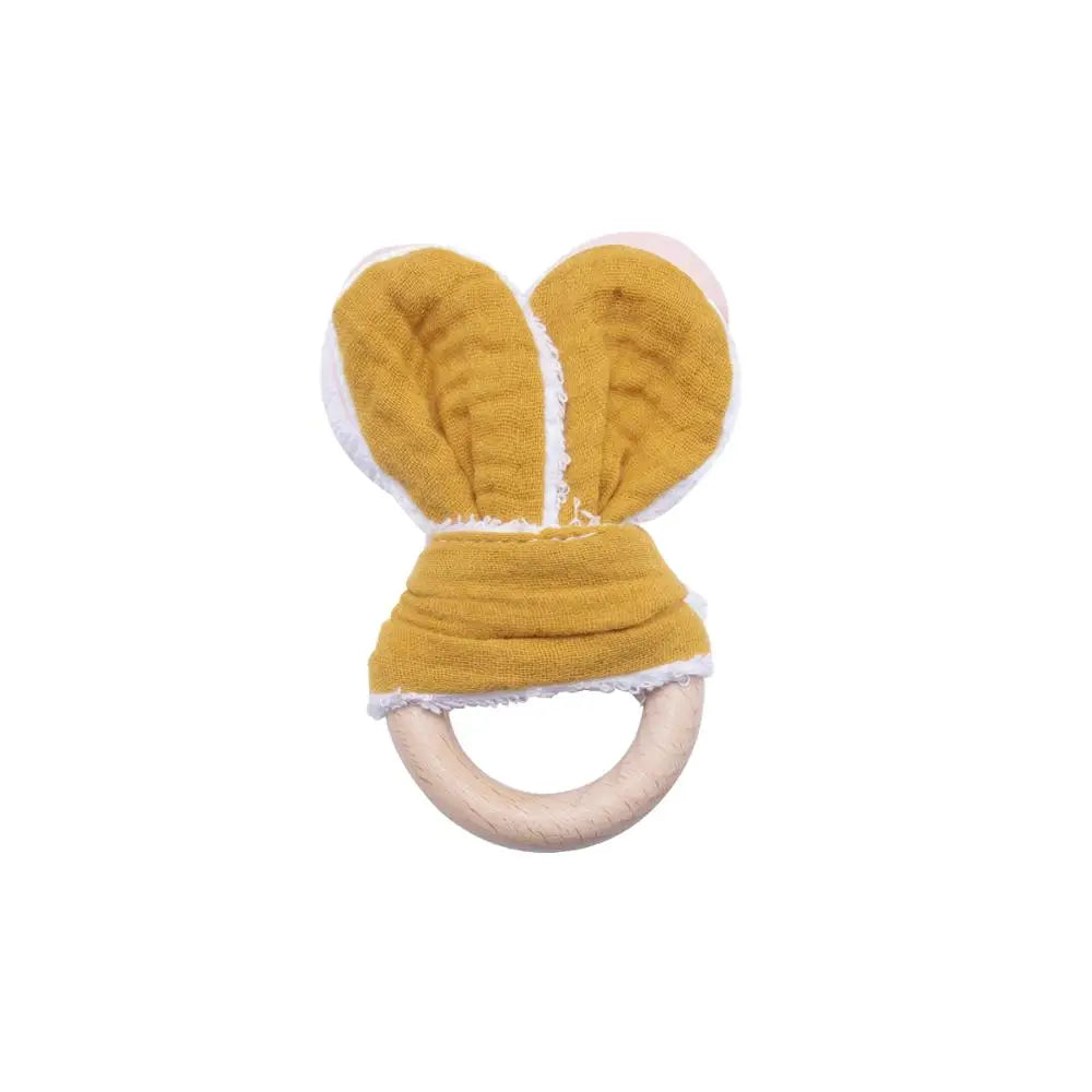 Discover our unisex wooden baby rattle teether, designed in a cute mouse shape with food-grade, non-toxic wooden material. Perfect for ages 0-24 months, this rattle helps relieve teething pain safely. Easy to clean with a damp towel