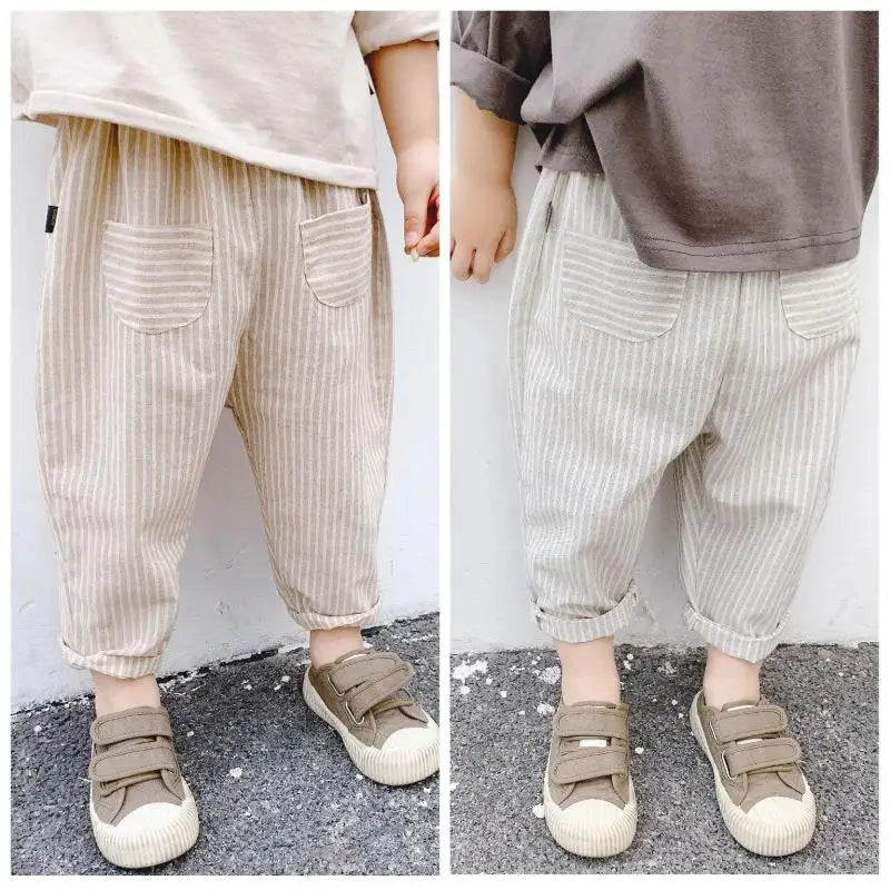 BabyLove Bubebaby Unisex cotton harem pants for children aged 4-6 years. Featuring a striped pattern, elastic waist, and pockets, these regular-fit pants are perfect for all seasons. True to size with a mid-waist design, offering comfort and style for any occasion