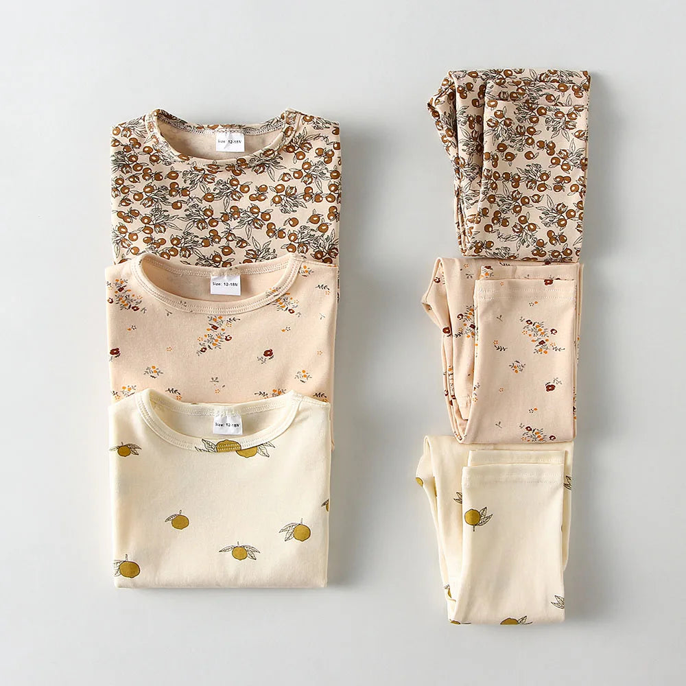 Shop the Babylove Spring Sleepwear Set at BubeBaby, featuring cozy cotton pajamas perfect for spring and autumn. Available for ages 7-12 months to 4-6 years, this unisex set includes a round-neck top and pants with a casual, printed design. Fits true to size with full sleeves and broadcloth fabric. Ideal for comfortable, stylish sleepwear