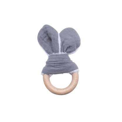 Discover our unisex wooden baby rattle teether, designed in a cute mouse shape with food-grade, non-toxic wooden material. Perfect for ages 0-24 months, this rattle helps relieve teething pain safely. Easy to clean with a damp towel