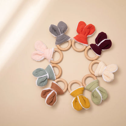 Discover our unisex wooden baby rattle teether, designed in a cute mouse shape with food-grade, non-toxic wooden material. Perfect for ages 0-24 months, this rattle helps relieve teething pain safely. Easy to clean with a damp towel