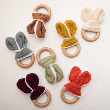 Discover our unisex wooden baby rattle teether, designed in a cute mouse shape with food-grade, non-toxic wooden material. Perfect for ages 0-24 months, this rattle helps relieve teething pain safely. Easy to clean with a damp towel