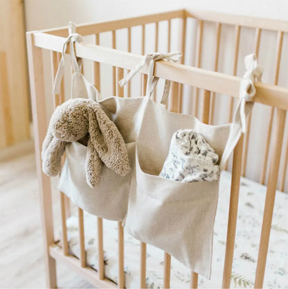 Discover BubeBaby's Nursery Crib Organizer, perfect for babies aged 0-1Y. Available in unisex colors (gray, pink, beige, navy blue), this versatile organizer comes in two styles: Canvas (29x49cm) and Muslin (20x39cm). Made from durable linen and ideal for year-round use, it keeps your nursery tidy and stylish