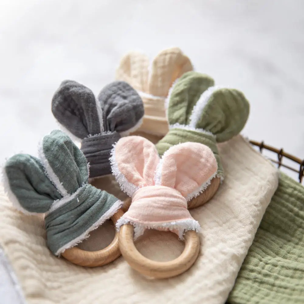 Discover our unisex wooden baby rattle teether, designed in a cute mouse shape with food-grade, non-toxic wooden material. Perfect for ages 0-24 months, this rattle helps relieve teething pain safely. Easy to clean with a damp towel