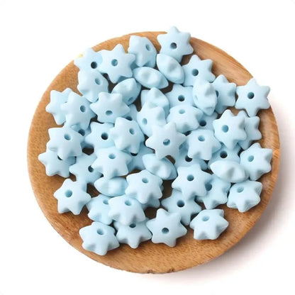 Explore our star-shaped silicone teether beads, packed in sets of 40. Made from BPA-free silicone, these teething beads are safe and durable. Note: Loose beads are a choking hazard; ensure they are threaded on anti-break nylon thread for safety