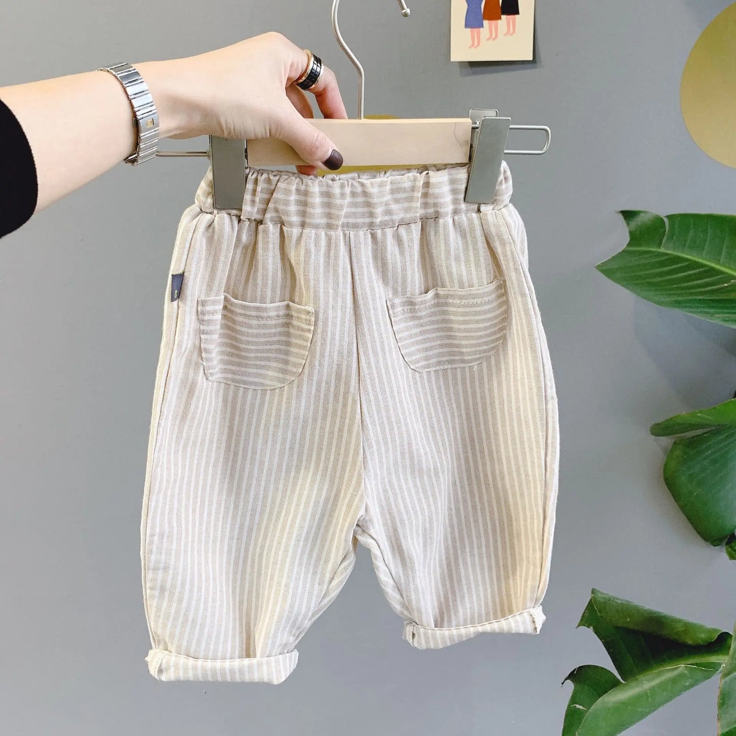 BabyLove Bubebaby Unisex cotton harem pants for children aged 4-6 years. Featuring a striped pattern, elastic waist, and pockets, these regular-fit pants are perfect for all seasons. True to size with a mid-waist design, offering comfort and style for any occasion