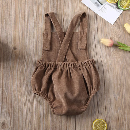 BabyLove Corduroy Unisex Romper - Soft, brown corduroy fabric with long sleeves, button-down front, and a cozy fit. Perfect for infants and toddlers. Gender-neutral design