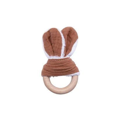 Discover our unisex wooden baby rattle teether, designed in a cute mouse shape with food-grade, non-toxic wooden material. Perfect for ages 0-24 months, this rattle helps relieve teething pain safely. Easy to clean with a damp towel