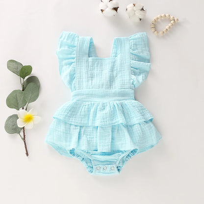 BabyLove Ruffled Jumpsuit at BubeBaby, perfect for baby girls aged 0-18 months. Made from soft cotton and polyester, this fashionable romper features a stylish O-neck and ruffled design.  it's ideal for spring and autumn