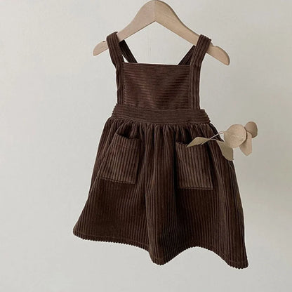 BabyLove corduroy pocket dress with long sleeves, featuring a classic A-line cut and a cute front pocket, perfect for casual, stylish looks