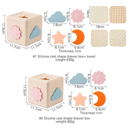 Babylove Silicone Tissue Box for kids aged 0-14+ years, free from high-concern chemicals. This Montessori toy enhances color recognition and shape pairing, made from high-quality silicone with a shape and nature theme. Ideal for developing early learning skills