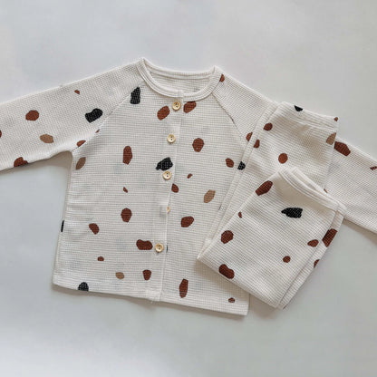 Bubebaby BabyLove toddler pajamas made from soft cotton fabric. The sleepwear set includes a top and pants with a comfortable, snug fit. The design features playful patterns or colors, making it both cozy and cute for bedtime