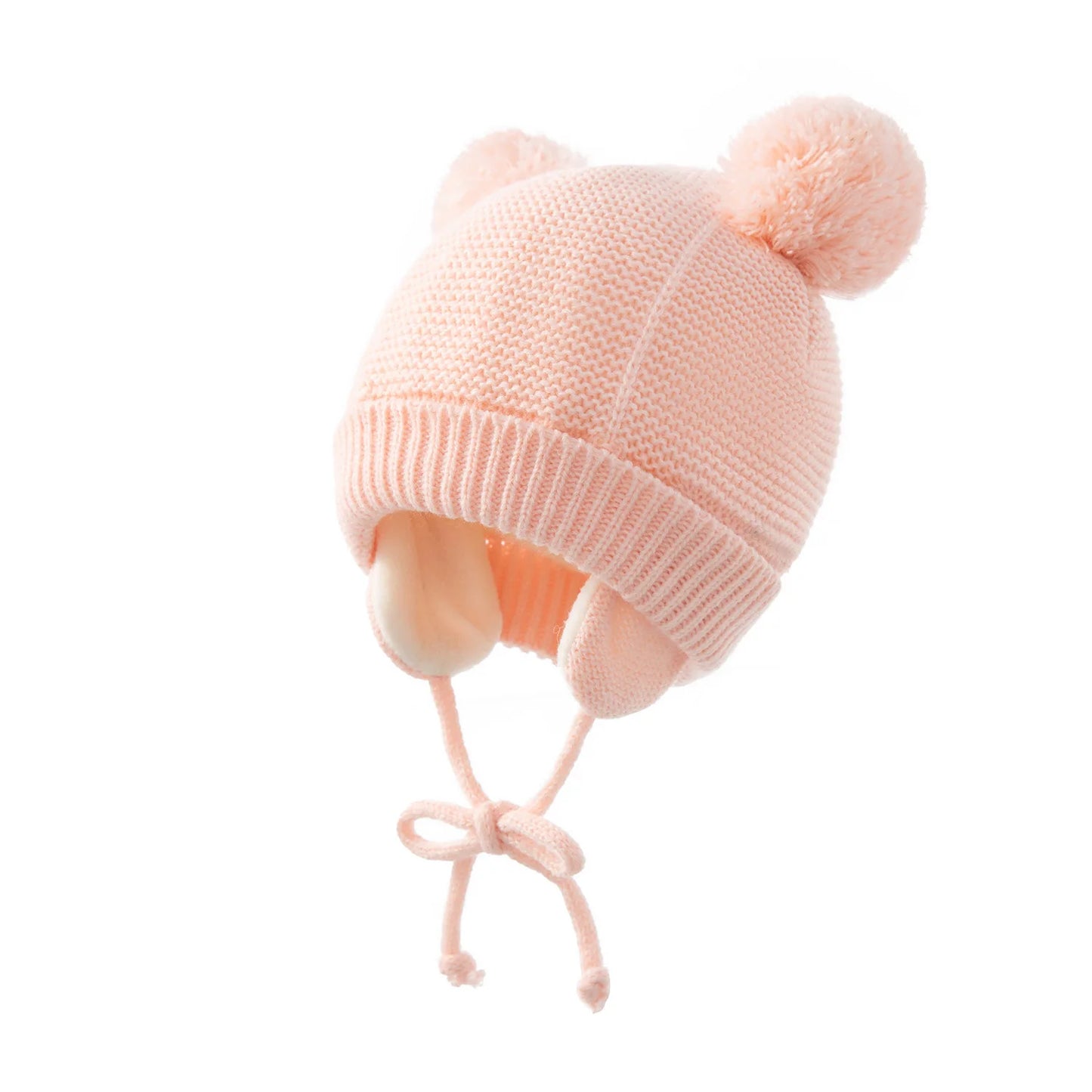 Shop the BabyLove Winter Knitted Bonnet at BubeBaby, perfect for keeping little ones warm in winter. Made from soft acrylic, this unisex bonnet features a solid pattern and ear protection design