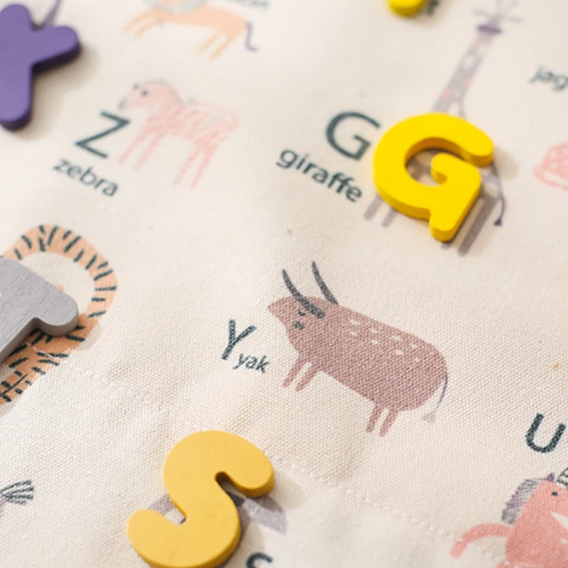 Shop the Montessori ABC Word and Letter Cognitive Puzzle at Bubebaby – an educational toy designed for children aged 0-6 years. Made with non-toxic materials and CE-certified for safety, this canvas-wrapped puzzle set promotes early literacy skills. Includes a canvas storage bag for easy organization