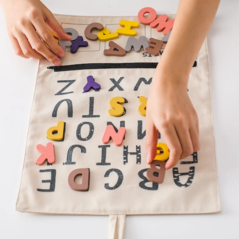 Shop the Montessori ABC Word and Letter Cognitive Puzzle at Bubebaby – an educational toy designed for children aged 0-6 years. Made with non-toxic materials and CE-certified for safety, this canvas-wrapped puzzle set promotes early literacy skills. Includes a canvas storage bag for easy organization