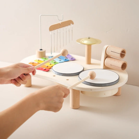 Discover the Bubebaby Montessori Music Table, an educational and non-electric musical instrument designed for children ages 0-14+. This table features engaging musical elements. Lightweight at 1.23kg and measuring 41.2X24.7X9.5cm, it's perfect for young learners seeking fun and educational play