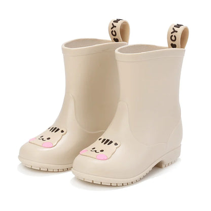 BabyLove Rain Boots at BubeBaby, Available in White, Pink, and Coffee, these waterproof PVC boots are perfect for kids aged 2-10. Featuring a cute pattern, breathable and non-slip design, and a true-to-size fit. Ideal for all seasons and keeping little feet dry on rainy days