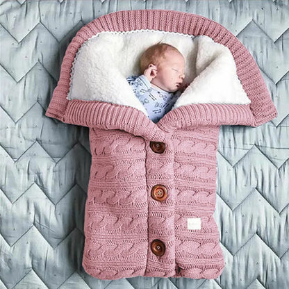 Nursery Knitted Sleeping Bag Cover at BubeBaby, designed for babies 0-12 months. Made from cozy wool and nylon, this unisex sleep sack is perfect for winter. Features include a solid pattern, knitted linen flower color, and measures 68x40 cm. Lightweight at 420g and packaged in a 40x32x3 cm box