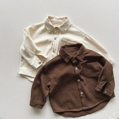 Discover this Unisex Casual Cotton Shirt from Bubebaby Babylove.Its perfect for kids aged 1-6Y. Made from soft broadcloth cotton, it features a solid color pattern, classic turn-down collar, and full sleeves. Ideal for autumn and spring, it offers a true-to-size fit with a regular length for everyday wear. 