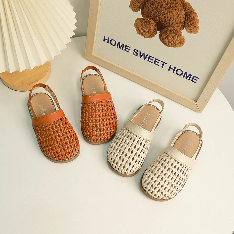 Discover BabyLove Woven Slip-On Sandals at BubeBaby, perfect for summer. These breathable sandals feature cut-outs and a soft leather style with a flat heel. Available in sizes from 14.5cm to 21.5cm, they fit true to size and offer a comfortable, stylish option for ages 4-6Y. Use our size guide for the perfect fit