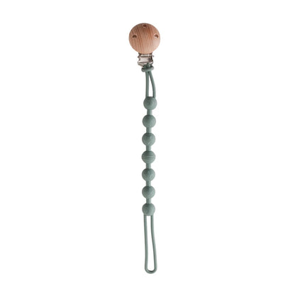 BabyLove Montessori Beech Wood and Silicone Beaded Pacifier Clip, a 20cm durable, BPA-free, phthalate-free, and latex-free accessory for babies aged 0-36 months. Features a solid color, wooden clip, and silicone strap. Versatile as a pacifier holder, soother chain, or teether toy. Safe and stylish design