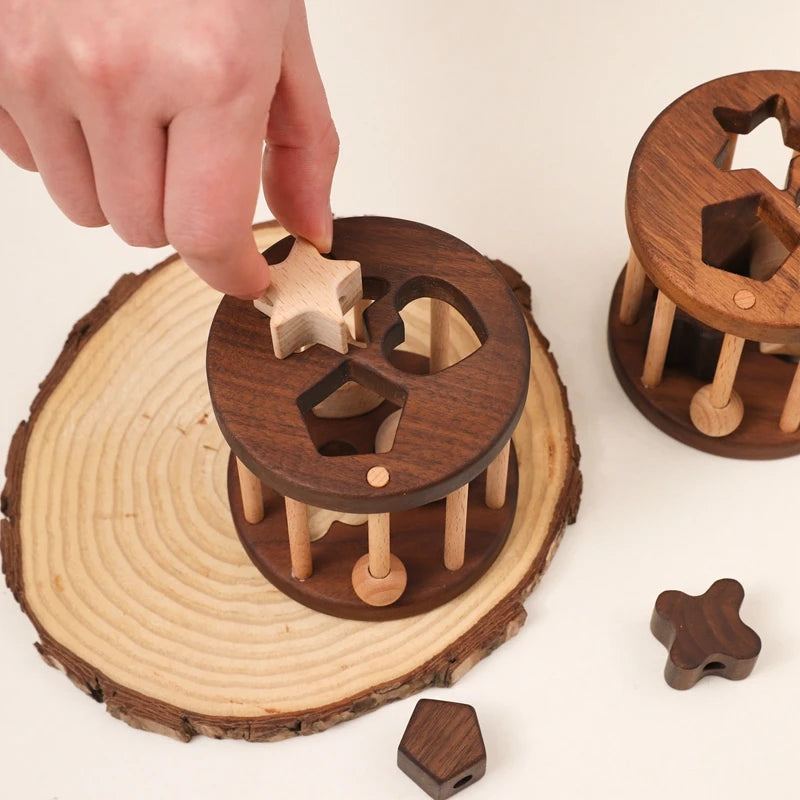 Introduce your child to learning with this Babylove Montessori Wooden Shape Matching and Threading Toy at Bubebaby. Suitable for ages 0-6, it boosts cognitive skills, hand-eye coordination, and pattern recognition. Made from non-toxic wood, free from harmful chemicals, it’s safe, durable, and perfect for educational play