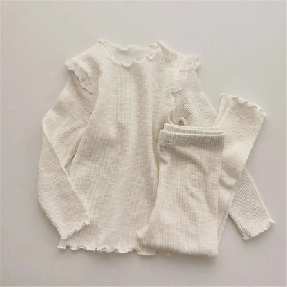 Shop the Babylove Spring Sleepwear Set at BubeBaby, featuring cozy cotton pajamas perfect for spring and autumn. Available for ages 7-12 months to 4-6 years, this unisex set includes a round-neck top and pants with a casual, printed design. Fits true to size with full sleeves and broadcloth fabric. Ideal for comfortable, stylish sleepwear