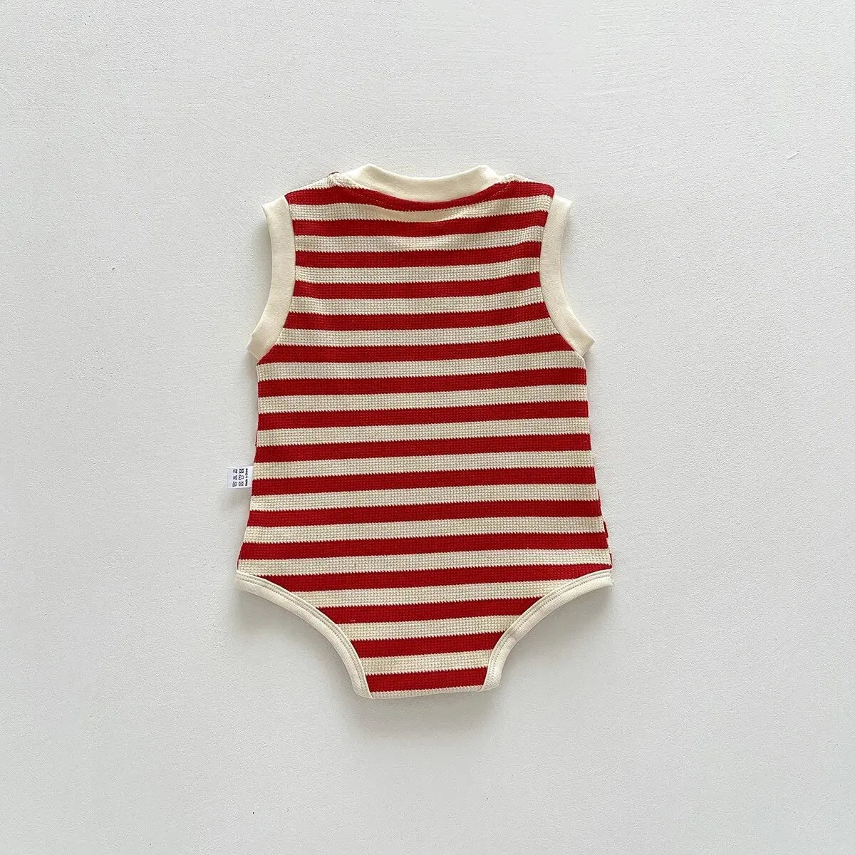 Keep your baby stylish and comfy with our BabyLove Striped Summer Sleeveless Romper From Bubebaby. Made from 95% cotton, this pullover romper features a breathable, sleeveless design perfect for hot days. Available in sizes for 0-24 months, it's ideal for keeping little ones cool and free to explore. Shop now for the perfect summer outfit