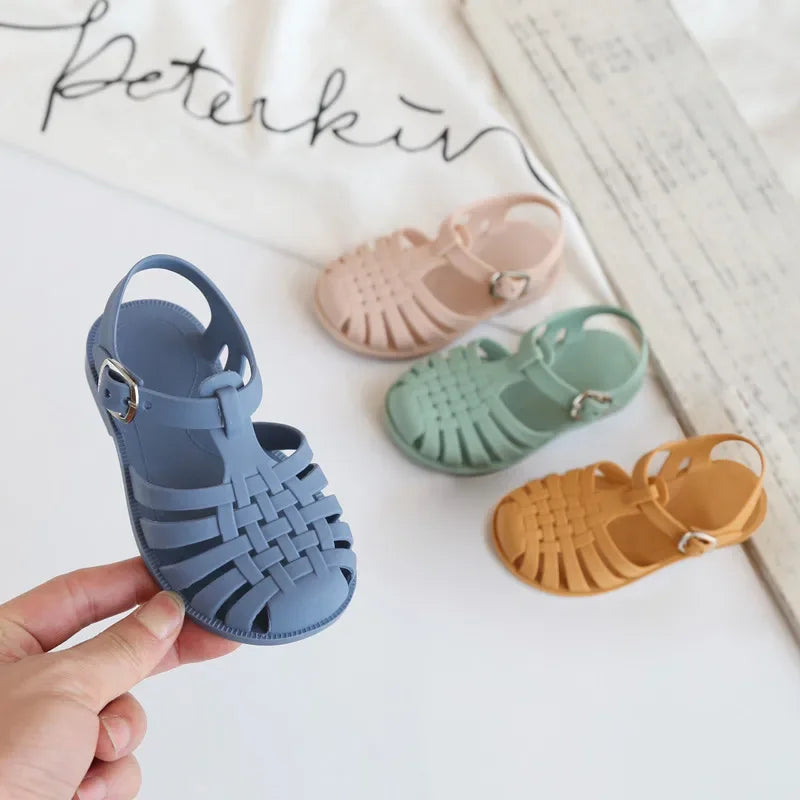 BabyLove Silicone Jelly Sandal at BubeBaby. These sandals feature a plastic outsole for durability and are designed with quick-dry, breathable, and anti-slippery features. Available in lengths of 10cm, 10.5cm, and 11cm, perfect for active little feet. Shop now for comfort and style