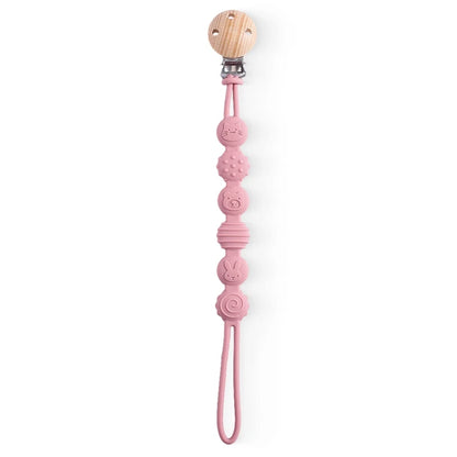 BabyLove Montessori Beech Wood and Silicone Beaded Pacifier Clip, a 20cm durable, BPA-free, phthalate-free, and latex-free accessory for babies aged 0-36 months. Features a solid color, wooden clip, and silicone strap. Versatile as a pacifier holder, soother chain, or teether toy. Safe and stylish design