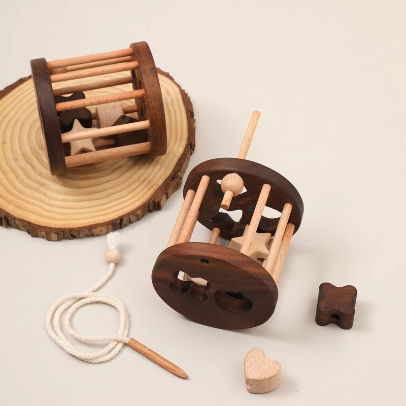 Introduce your child to learning with this Babylove Montessori Wooden Shape Matching and Threading Toy at Bubebaby. Suitable for ages 0-6, it boosts cognitive skills, hand-eye coordination, and pattern recognition. Made from non-toxic wood, free from harmful chemicals, it’s safe, durable, and perfect for educational play