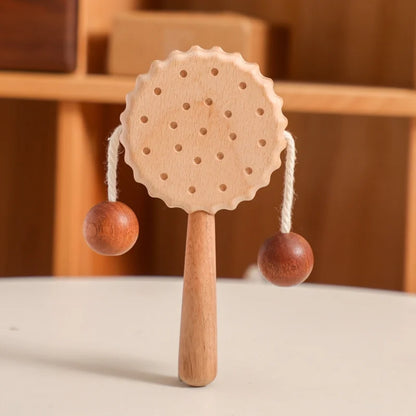 Discover the Bubebaby BabyLove Montessori Wooden Rattle, crafted from high-quality wood for unisex use. For ages 7-24 months, it features engaging cartoon shapes and musical elements. CE certified for safety, it measures 15 x 7.2 cm and weighs 60g.