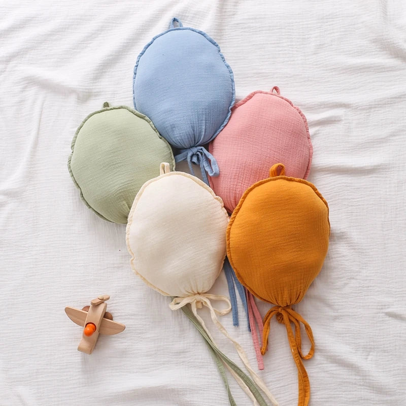 Add a touch of charm to your nursery with our Wall Hung Decorative Balloon Pillow. Perfect for all ages, this unisex pillow adds a whimsical touch to any room. Ideal for newborns, toddlers, and young children, it's a delightful and versatile décor piece for your baby’s space only at BubeBaby