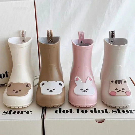 BabyLove Rain Boots at BubeBaby, Available in White, Pink, and Coffee, these waterproof PVC boots are perfect for kids aged 2-10. Featuring a cute pattern, breathable and non-slip design, and a true-to-size fit. Ideal for all seasons and keeping little feet dry on rainy days