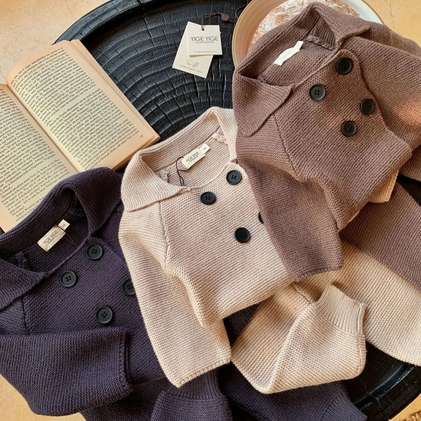 Winter knit set for babies from Bubebaby BabyLove. The set includes a cozy knit pants and jacket top designed to keep little ones warm during colder months. The design features a soft, textured knit pattern and is available in a variety of colors