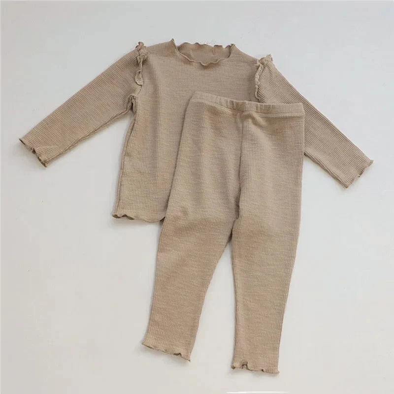 Shop the Babylove Spring Sleepwear Set at BubeBaby, featuring cozy cotton pajamas perfect for spring and autumn. Available for ages 7-12 months to 4-6 years, this unisex set includes a round-neck top and pants with a casual, printed design. Fits true to size with full sleeves and broadcloth fabric. Ideal for comfortable, stylish sleepwear