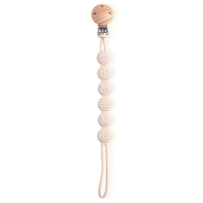 BabyLove Montessori Beech Wood and Silicone Beaded Pacifier Clip, a 20cm durable, BPA-free, phthalate-free, and latex-free accessory for babies aged 0-36 months. Features a solid color, wooden clip, and silicone strap. Versatile as a pacifier holder, soother chain, or teether toy. Safe and stylish design