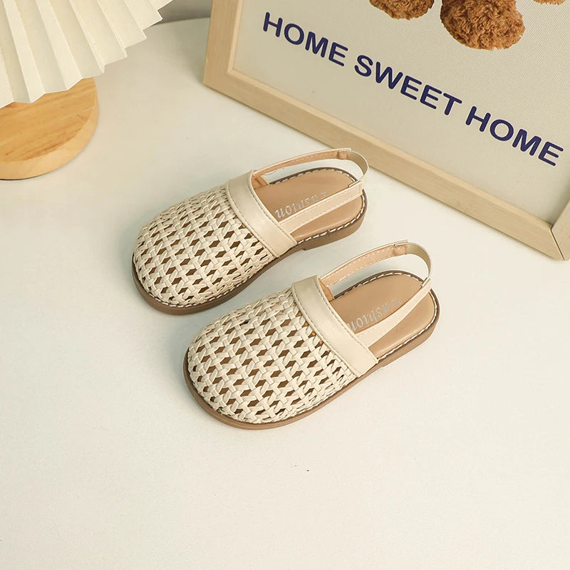 Discover BabyLove Woven Slip-On Sandals at BubeBaby, perfect for summer. These breathable sandals feature cut-outs and a soft leather style with a flat heel. Available in sizes from 14.5cm to 21.5cm, they fit true to size and offer a comfortable, stylish option for ages 4-6Y. Use our size guide for the perfect fit