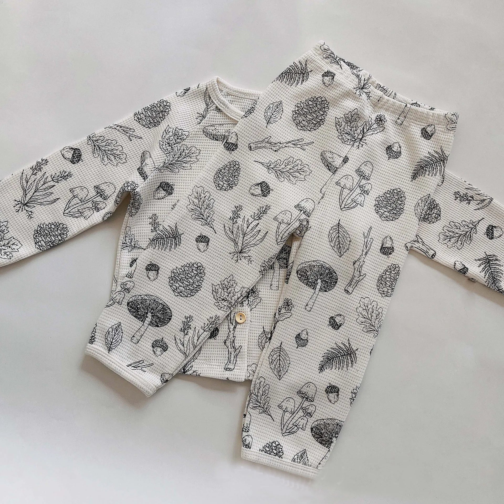 Bubebaby BabyLove toddler pajamas made from soft cotton fabric. The sleepwear set includes a top and pants with a comfortable, snug fit. The design features playful patterns or colors, making it both cozy and cute for bedtime