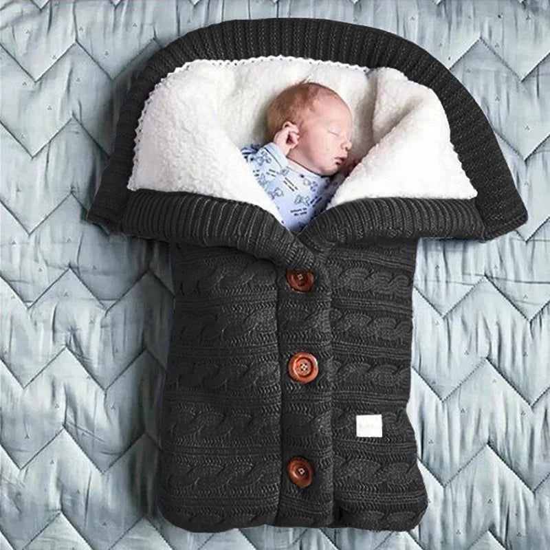 Nursery Knitted Sleeping Bag Cover at BubeBaby, designed for babies 0-12 months. Made from cozy wool and nylon, this unisex sleep sack is perfect for winter. Features include a solid pattern, knitted linen flower color, and measures 68x40 cm. Lightweight at 420g and packaged in a 40x32x3 cm box