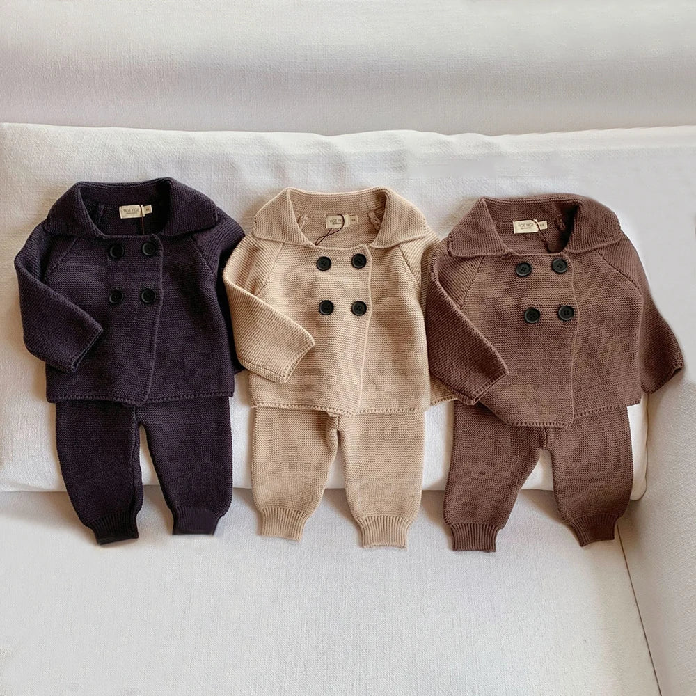 Winter knit set for babies from Bubebaby BabyLove. The set includes a cozy knit pants and jacket top designed to keep little ones warm during colder months. The design features a soft, textured knit pattern and is available in a variety of colors