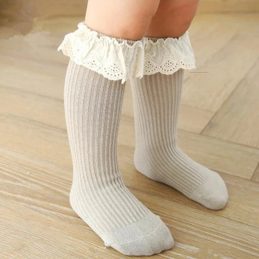 Bubebaby Babylove socks, perfect for all occasions. Made from cotton and polyester, these breathable comfortable, and skin-friendly socks are made with a solid pastoral style  featuring a ruffled frill finish