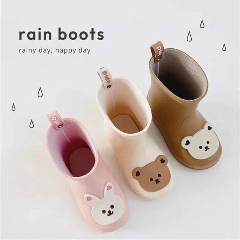 BabyLove Rain Boots at BubeBaby, Available in White, Pink, and Coffee, these waterproof PVC boots are perfect for kids aged 2-10. Featuring a cute pattern, breathable and non-slip design, and a true-to-size fit. Ideal for all seasons and keeping little feet dry on rainy days