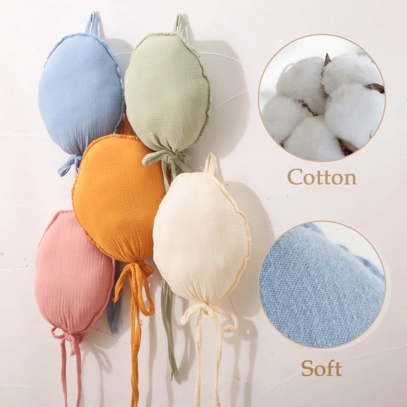 Add a touch of charm to your nursery with our Wall Hung Decorative Balloon Pillow. Perfect for all ages, this unisex pillow adds a whimsical touch to any room. Ideal for newborns, toddlers, and young children, it's a delightful and versatile décor piece for your baby’s space only at BubeBaby