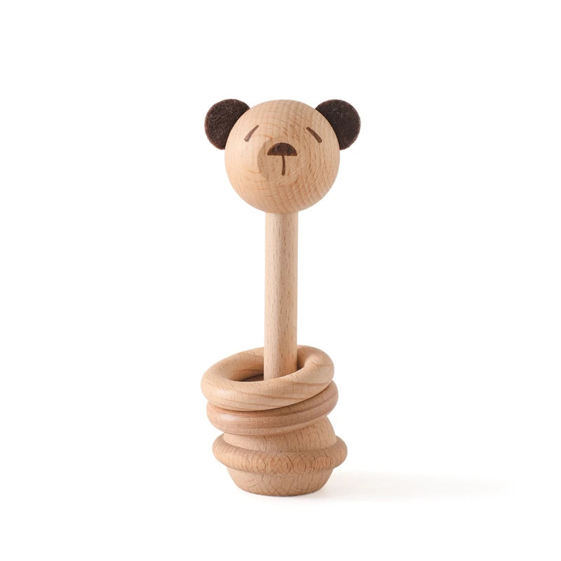 Explore our natural wood geometric rattle from Bubebaby BabyLove, designed for babies aged 0-36 months. CE-certified and crafted from high-quality wood, this unisex rattle features a variety of geometric shapes. Perfect for early sensory development and safe for all little ones