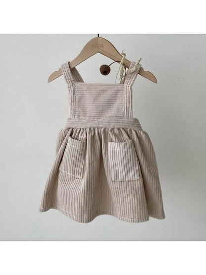 BabyLove corduroy pocket dress with long sleeves, featuring a classic A-line cut and a cute front pocket, perfect for casual, stylish looks