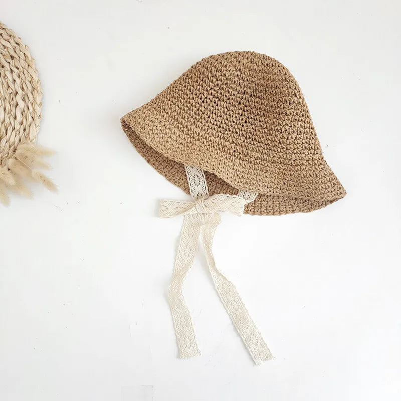 Keep your little one cool and stylish with the Bubebaby Babylove Straw Children's Hat. Perfect for summer vacations, this adjustable hat fits babies aged 0-6 years and comes in two sizes. Made from high-quality straw, it's designed for comfort and sun protection. Ideal for baby girls