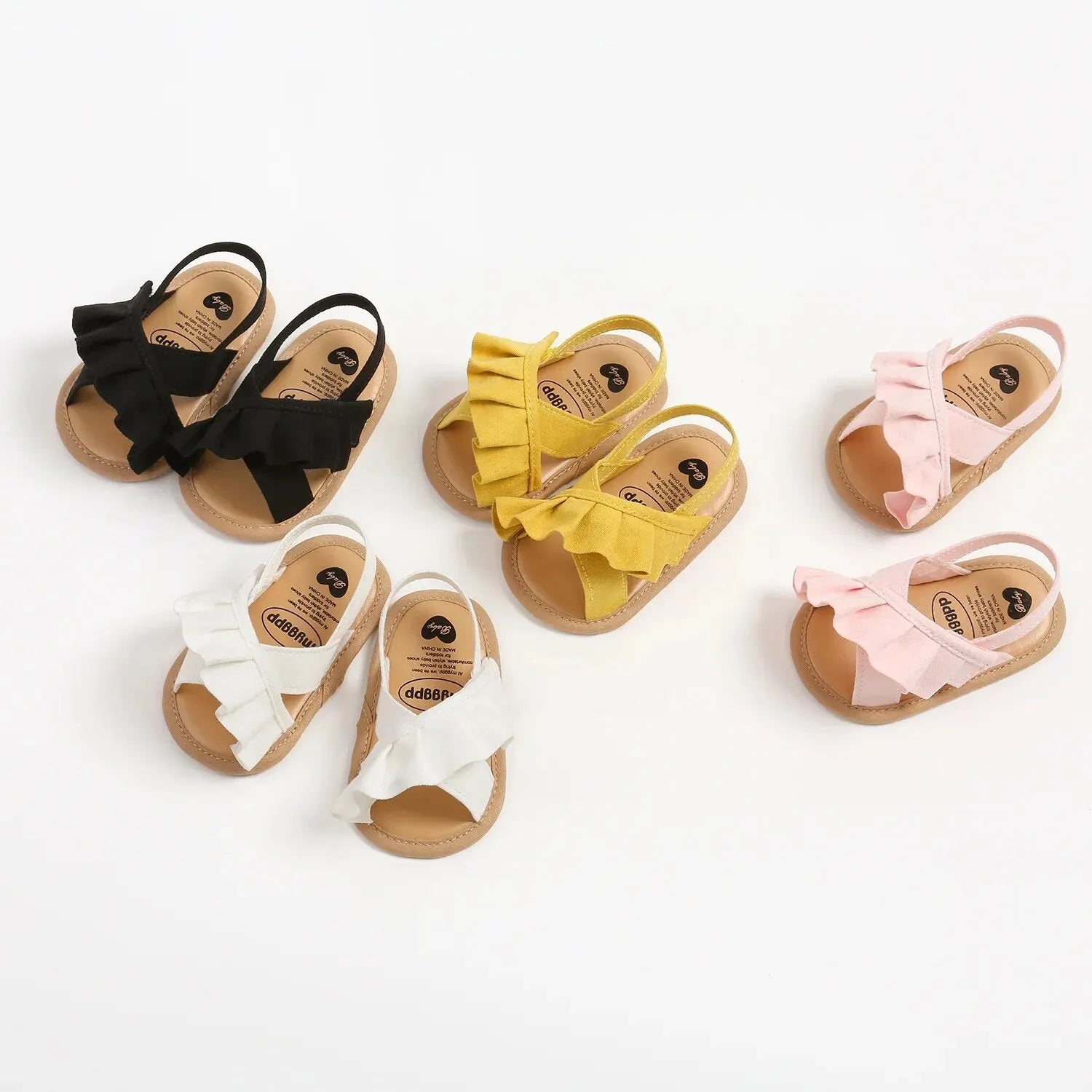 Discover BabyLove Sandals at BubeBaby! These summer sandals feature a flat heel, canvas upper. Ideal for baby girls, these sandals offer comfort and style for warm weather