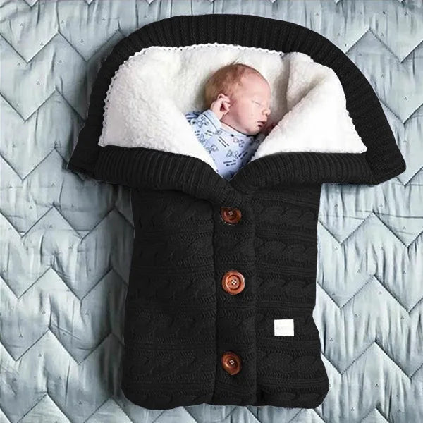 Nursery Knitted Sleeping Bag Cover at BubeBaby, designed for babies 0-12 months. Made from cozy wool and nylon, this unisex sleep sack is perfect for winter. Features include a solid pattern, knitted linen flower color, and measures 68x40 cm. Lightweight at 420g and packaged in a 40x32x3 cm box