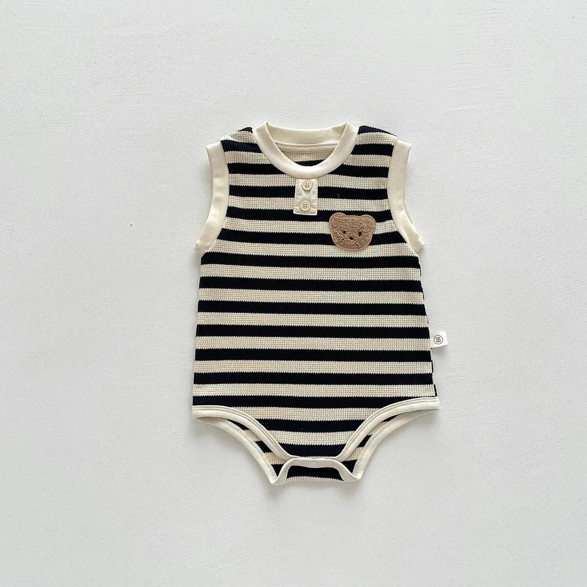 Keep your baby stylish and comfy with our BabyLove Striped Summer Sleeveless Romper From Bubebaby. Made from 95% cotton, this pullover romper features a breathable, sleeveless design perfect for hot days. Available in sizes for 0-24 months, it's ideal for keeping little ones cool and free to explore. Shop now for the perfect summer outfit